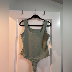 Francesca's Sage Tagged Scoop Neck Bodysuit Label